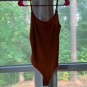 Orange bodysuit